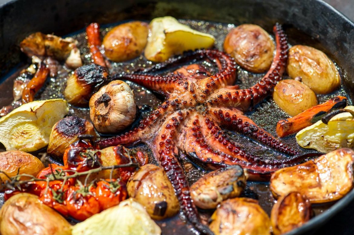 Octopus under the bell is a traditionally prepared culinary masterpiece